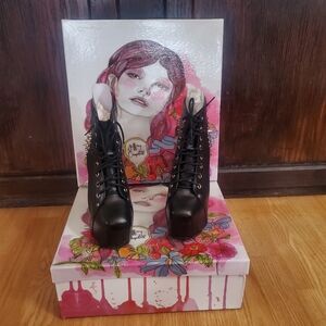 Sleek Black leather Lace-Up Boots for Every Occasion. Brand new.